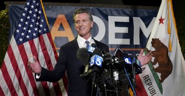 California Gov. Gavin Newsom addresses reporters after beating back the recall attempt that aimed to remove him from office, at the John L. Burton California Democratic Party headquarters in Sacramento, California, U.S., Sept. 14, 2021. (AP Photo)