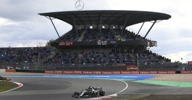 Mercedes driver Lewis Hamilton steers his car to win the Eifel Formula One Grand Prix at the Nurburgring racetrack in Nurburg, Germany, Oct. 11, 2020. (AP Photo)