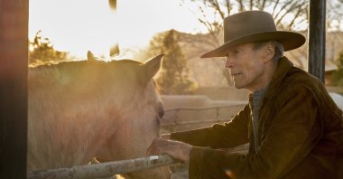 This image released by Warner Bros. Pictures shows Clint Eastwood in a scene from "Cry Macho." (Claire Folger/Warner Bros. Pictures via AP)