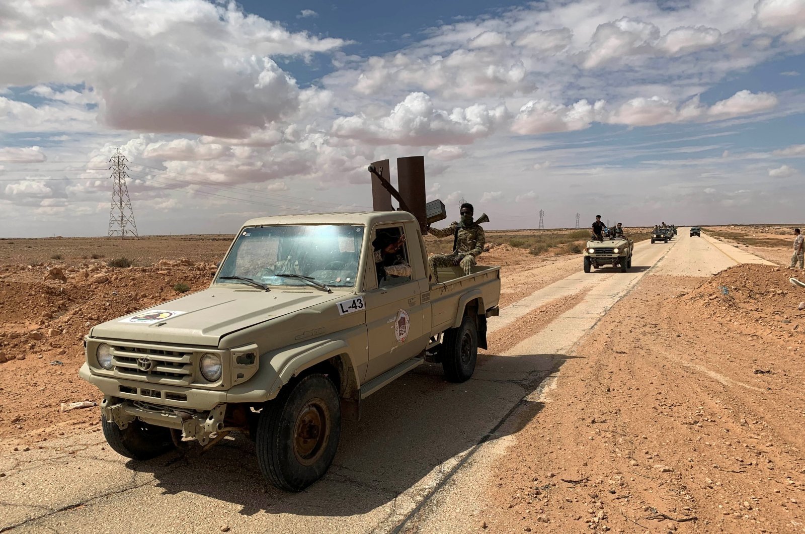 Troops loyal to Libya's internationally recognized government patrol the area in Zamzam, near Abu Qareen, Libya, Sept. 15, 2020. (Reuters Photo)