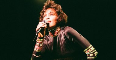 Whitney Houston performs at a concert in Earls Court Exhibition Center as part of "The Bodyguard World Tour," London, Nov. 5, 1993. (Getty Images)