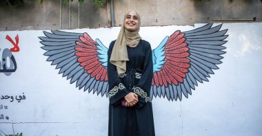 Muna al-Kurd, a 23-year-old Palestinian activist, poses for a photo in Sheikh Jarrah, occupied East Jerusalem, Palestine, June 10, 2021. (AA Photo)