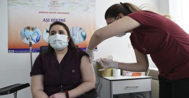 A health care worker gets vaccinated with CoronaVac, in the capital Ankara, Turkey, Jan. 20, 2021. (AA PHOTO)