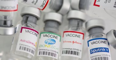 Vials of COVID-19 vaccines labeled AstraZeneca, Pfizer-BioNTech, Johnson & Johnson and Sputnik V are seen in this illustration picture taken on May 2, 2021. (Reuters Photo)