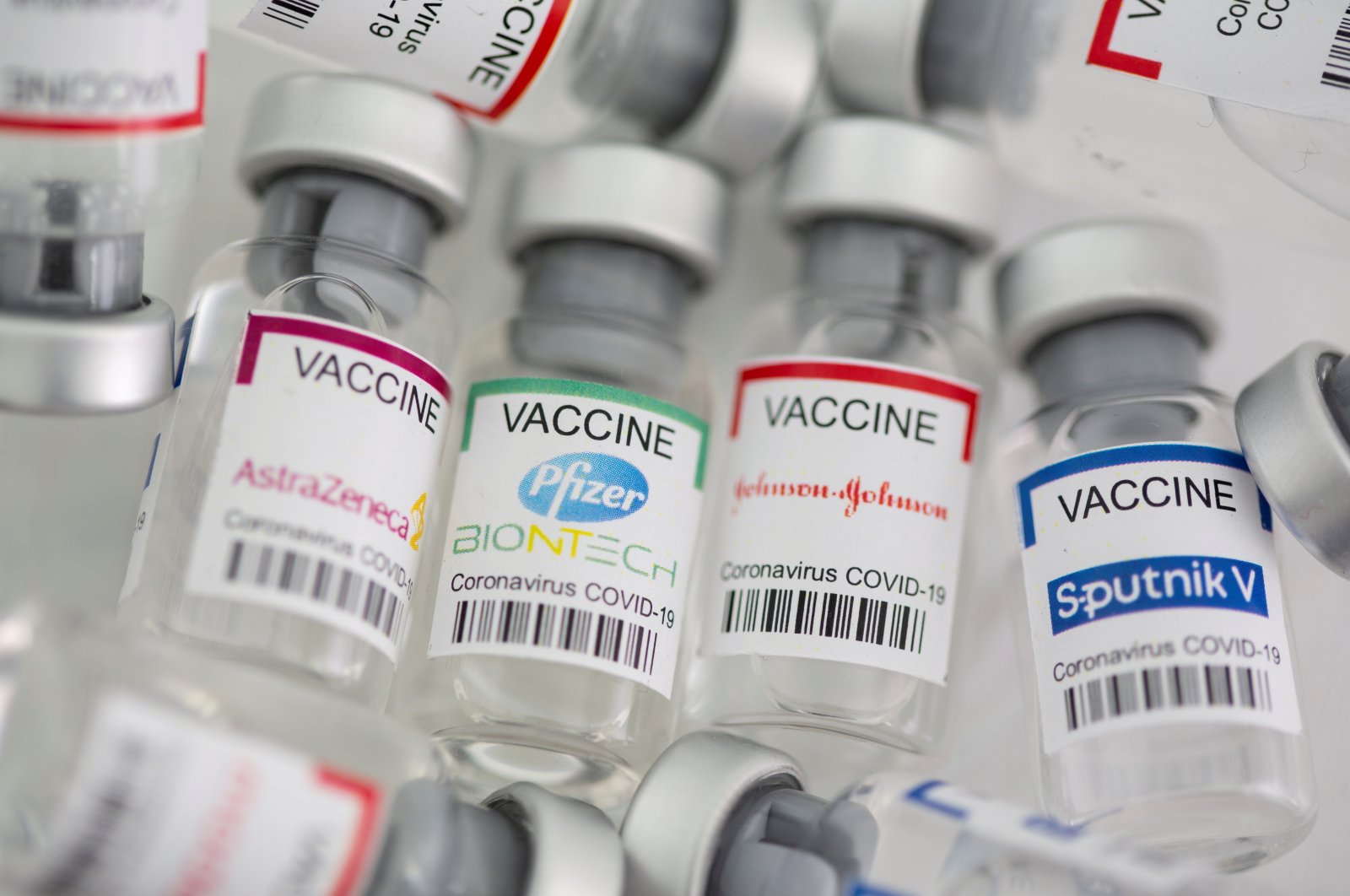 Vials of COVID-19 vaccines labeled AstraZeneca, Pfizer-BioNTech, Johnson & Johnson and Sputnik V are seen in this illustration picture taken on May 2, 2021. (Reuters Photo)