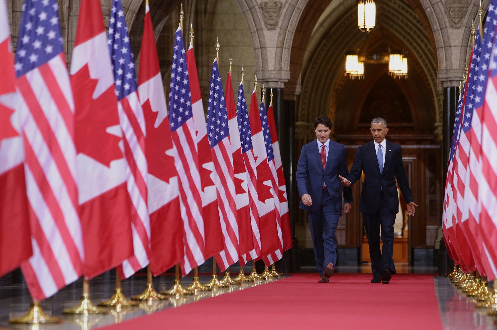 Justin Trudeau, Canada's prime minister (L) and then U.S. President Barack Obama, speak as they walk inside the Hall of Honour inside Parliament Hill in Ottawa, Ontario, Canada, June 29, 2016 (Bloomberg via Getty Images)