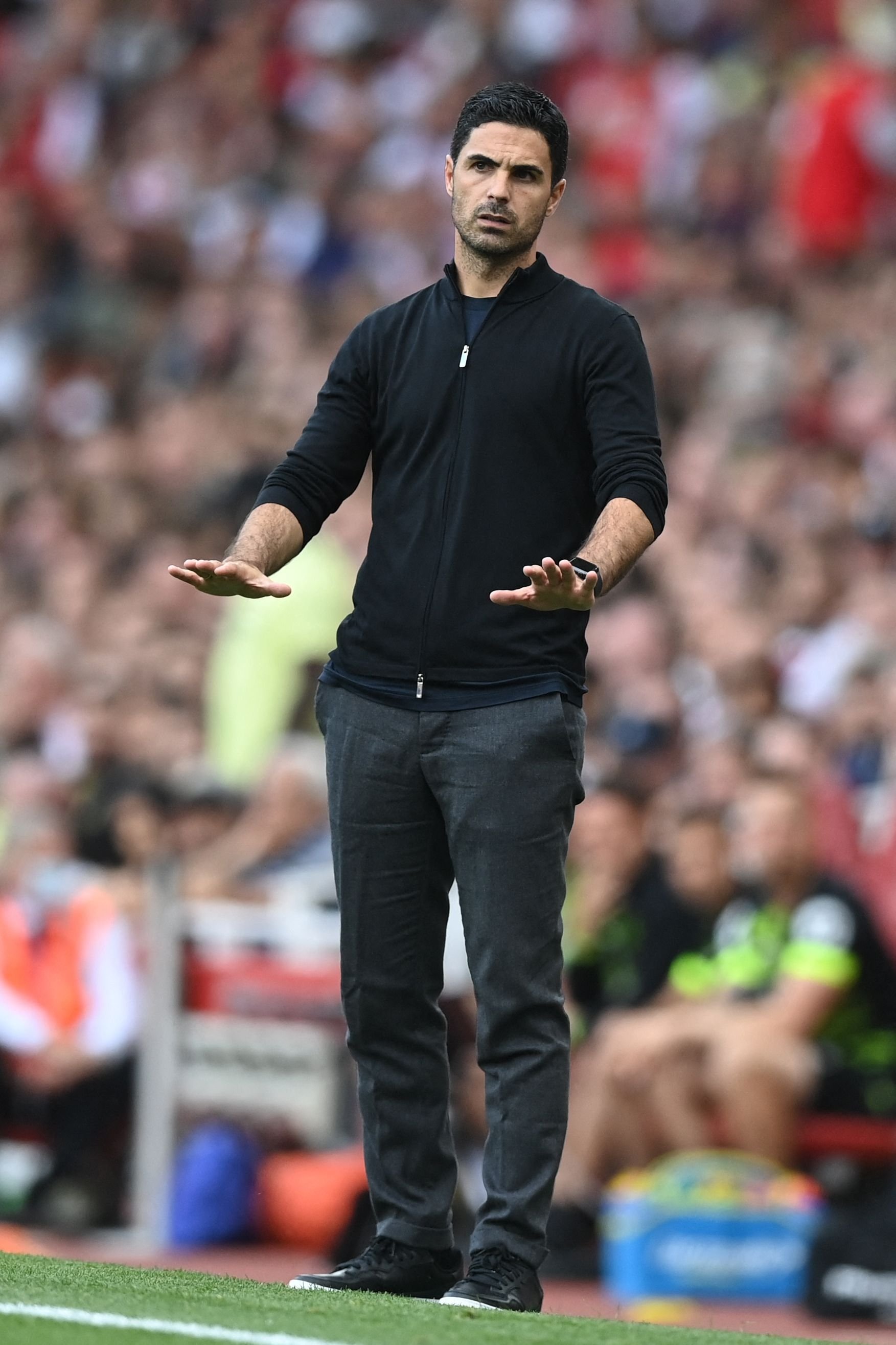 Arsenal's Spanish manager Mikel Arteta gestures during a Premier League match against Norwich City at the Emirates Stadium, London, England, Sept. 11, 2021. (AFP Photo)