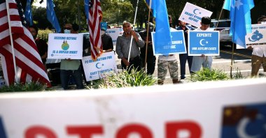 Signs are seen as members of the Uyghurs community, a mainly Muslim ethnic group originating from central and east Asia, rally against the Chinese government at the U.S. State Department, Washington, D.C., U.S., Sept. 15, 2021. (Getty Images/AFP)