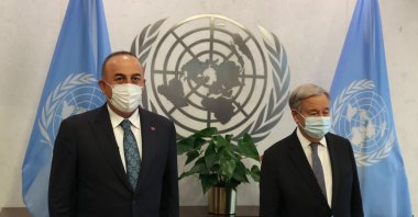 Foreign Minister Mevlüt Çavuşoğlu (L) and U.N. Secretary-General Antonio Guterres pose for a picture at the U.N. headquarters in New York City, New York, U.S., Sept. 17, 2021. (IHA Photo)