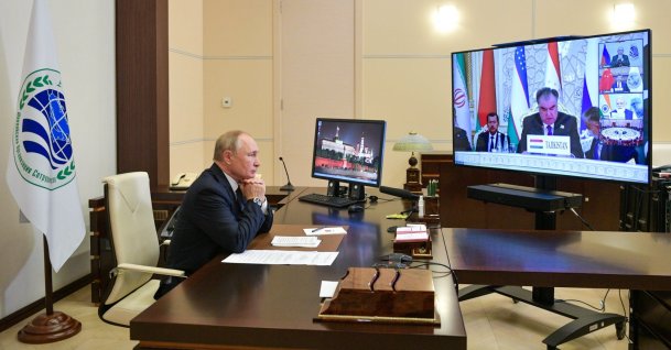 Russian President Vladimir Putin takes part in the Shanghai Cooperation Organization (SCO) meeting in Dushanbe, Tajikistan via videoconference at the Novo-Ogaryovo residence outside Moscow, Russia, Sept. 17, 2021. (AP Photo)