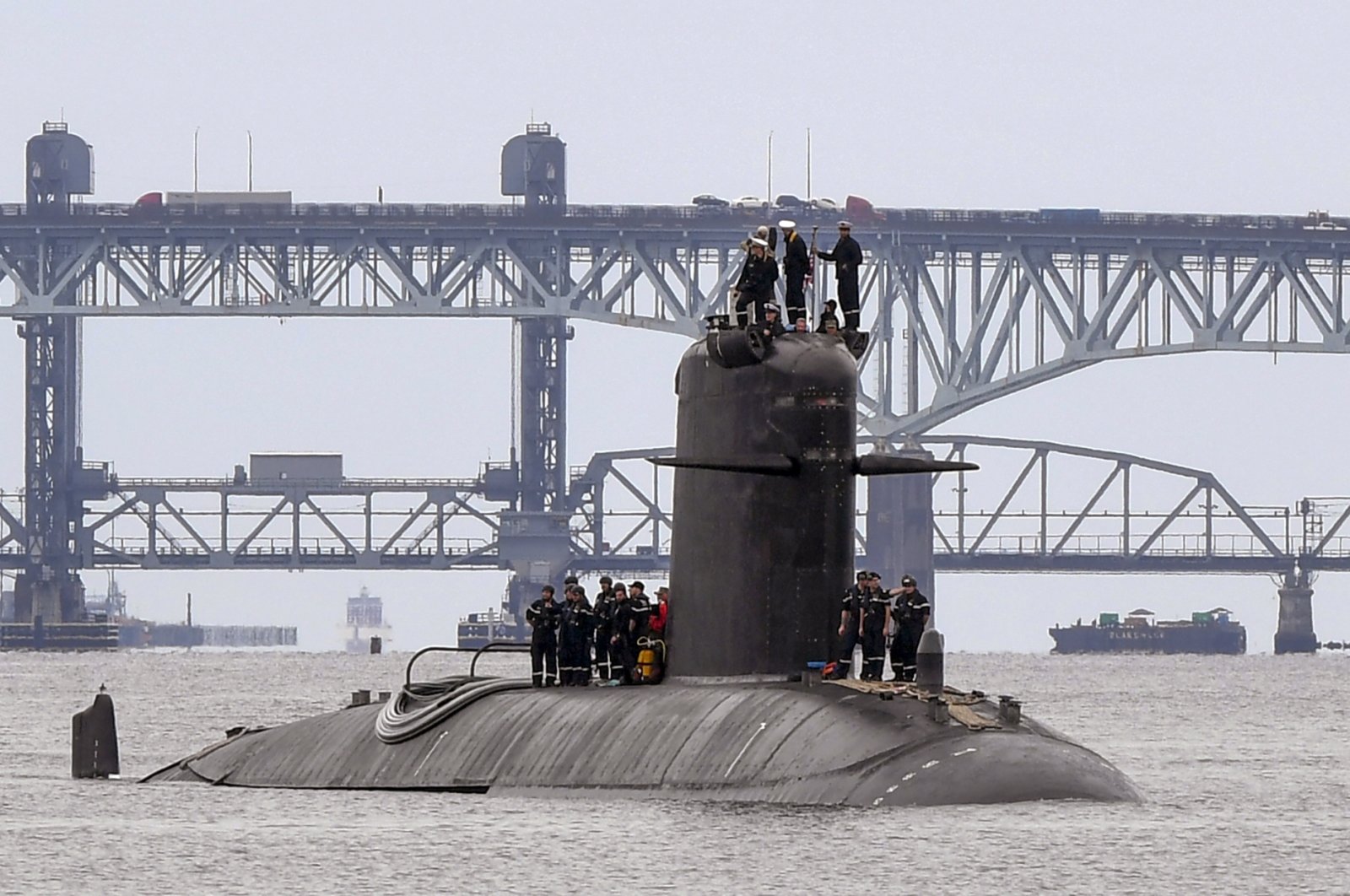 In this photo provided by U.S. Navy, French submarine FNS Amethyste (S605) transits the Thames River in preparation to arrive at Naval Submarine Base New London in Groton, Connecticut, U.S., Sept. 1, 2021. (U.S. Navy via AP)