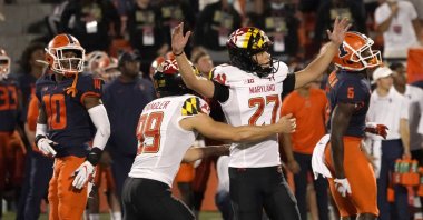 Maryland's Joseph Petrino celebrates his game-winning field goal with holder Colton Spangler during the second half of the team's college football game against Illinois at Memorial Stadium, Champaign, Illinois, U.S., Sept. 17, 2021. (AP Photo)