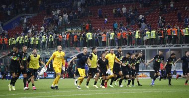 Inter Milan players celebrate after the Italian Serie A match against Bologna at the San Siro Stadium, in Milan, Italy, Sept. 18, 2021. (Reuters Photo)