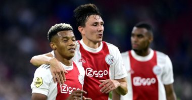 Ajax' Brazilian forward David Neres (L) and Dutch forward Steven Berghuis celebrate their fourth goal during the Dutch Eredivisie football match between Ajax Amsterdam and SC Cambuur at the Johan Cruijff ArenA in Amsterdam, Netherlands, Sept. 18, 2021. (AFP Photo)
