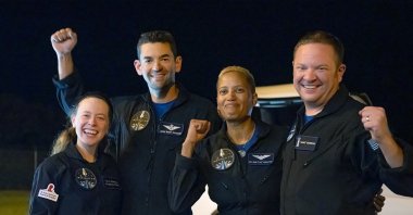 In this image released by Inspiration4, passengers aboard a SpaceX capsule, from left to right, Hayley Arceneaux, Jared Isaacman, Sian Proctor and Chris Sembroski pose after the capsule was recovered following its splashdown in the Atlantic off the Florida coast, Sept. 18, 2021. (Inspiration4 via AP)