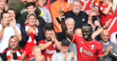 Sadio Mane celebrates scoring his 100th goal in a Liverpool shirt during the Premier League match against Crystal Palace at Anfield, Liverpool, England, Sept. 18, 2021. (Reuters Photo)