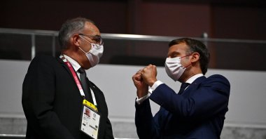 President of Switzerland Guy Parmelin and President of France Emmanuel Macron are seen prior to the Opening Ceremony of the Tokyo 2020 Olympic Games at the Olympic Stadium on July 23, 2021, Tokyo, Japan. (Getty Images)