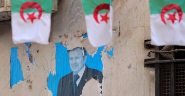An old poster of former Algerian President Abdelaziz Bouteflika, following his death, is seen, Algiers, Algeria, Sept.18, 2021. (Reuters Photo)