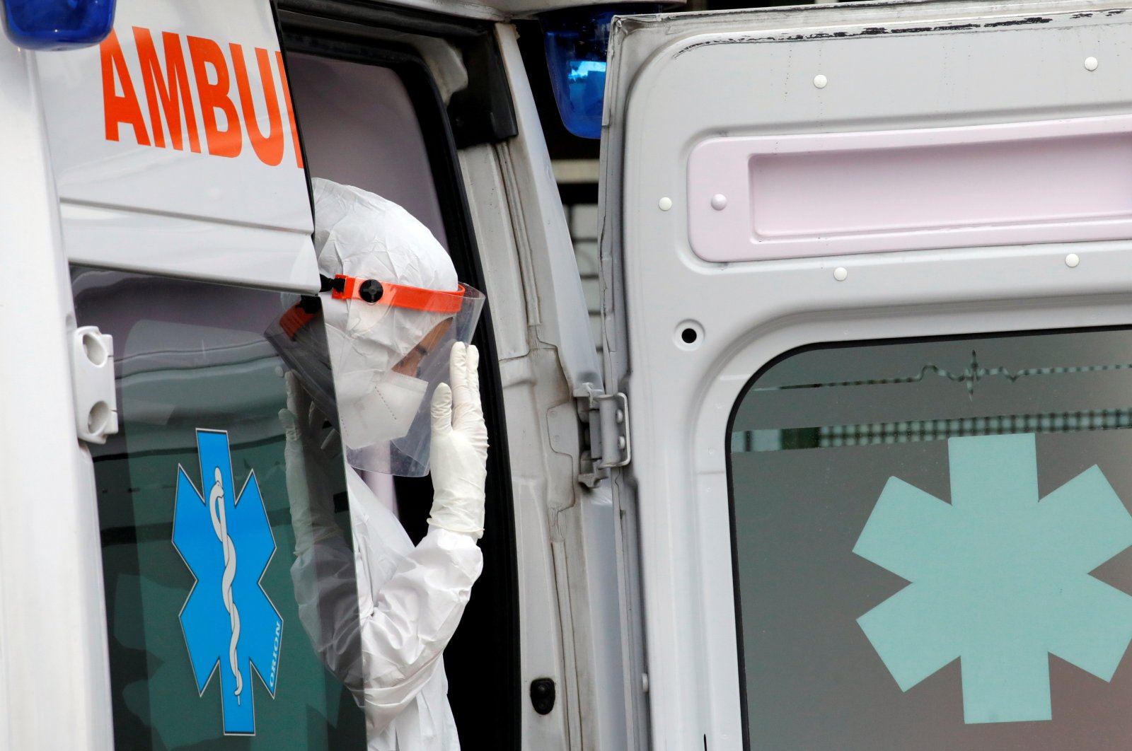 A medical worker is seen in an ambulance at the entrance of the Cardarelli hospital, amid the outbreak of COVID-19 in Naples, Italy, Nov. 12, 2020. (Reuters Photo)