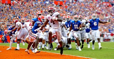 Alabama Crimson Tide running back Brian Robinson Jr. (4) scores a touchdown during the third quarter against the Florida Gators at Ben Hill Griffin Stadium, Gainesville, Florida, U.S., Sept. 18, 2021. (Mark J. Rebilas-USA TODAY Sports via Reuters)