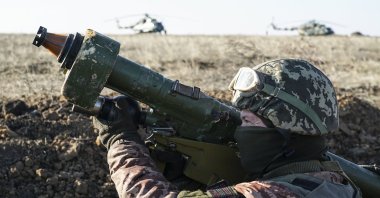 A Ukrainian soldier aims with an anti-aircraft rocker launcher during military exercises near Urzuf, south coast of Azov sea, eastern Ukraine, Nov. 29, 2018. (AP Photo)