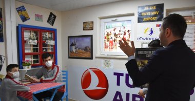 Muhammet Aydın teaches English in a "simulated" airport at his school, in Ordu, northern Turkey, Sept. 19, 2021. (AA PHOTO) 