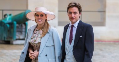 Britain's Princess Beatrice of York (L) and Edoardo Mapelli Mozzi (R) arrive for the wedding ceremony of the Prince Napoleon Countess Arco-Zinneberg at the Saint-Louis-des-Invalides cathedral at the Invalides National Hotel in Paris, France, Oct. 19, 2019. (EPA Photo)