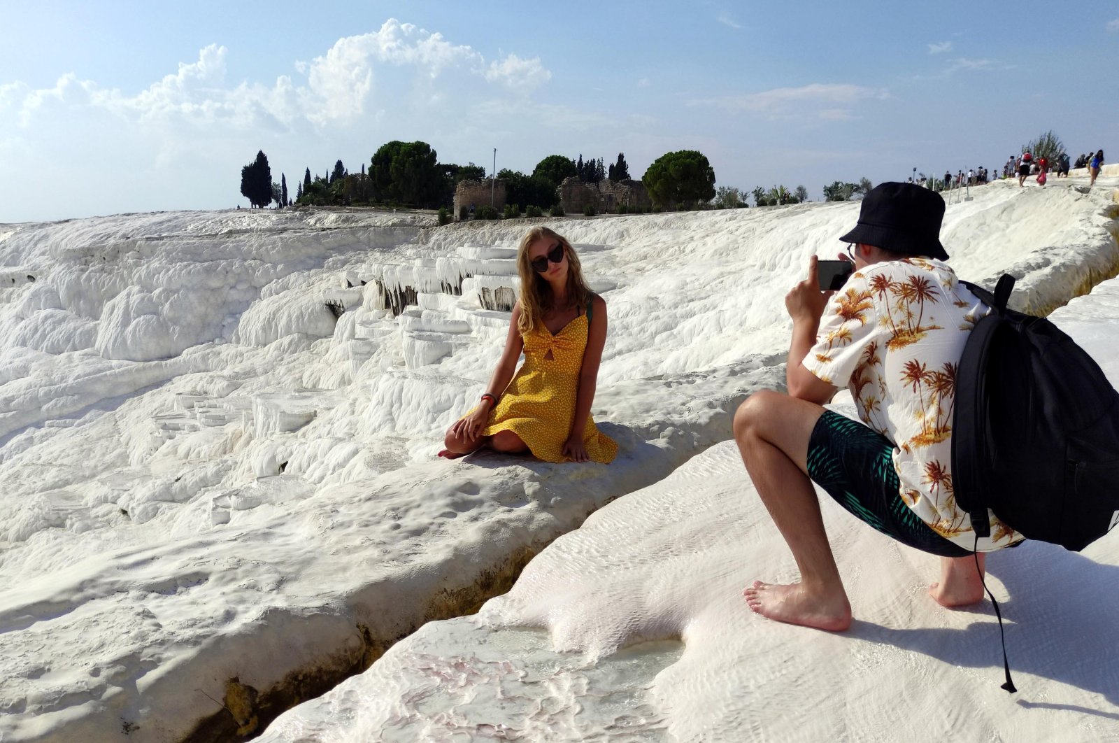 A woman poses for the camera in Pamukkale, Denizli, western Turkey, Sept. 19, 2021. (DHA Photo)