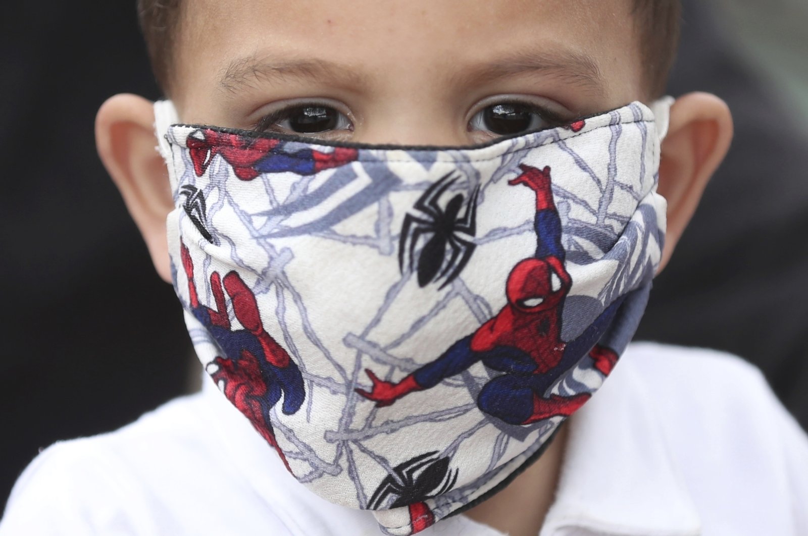 A boy wears a Spider-man face mask amid the spread of the coronavirus in Bogota, Colombia, April 30, 2020. (AP Photo)