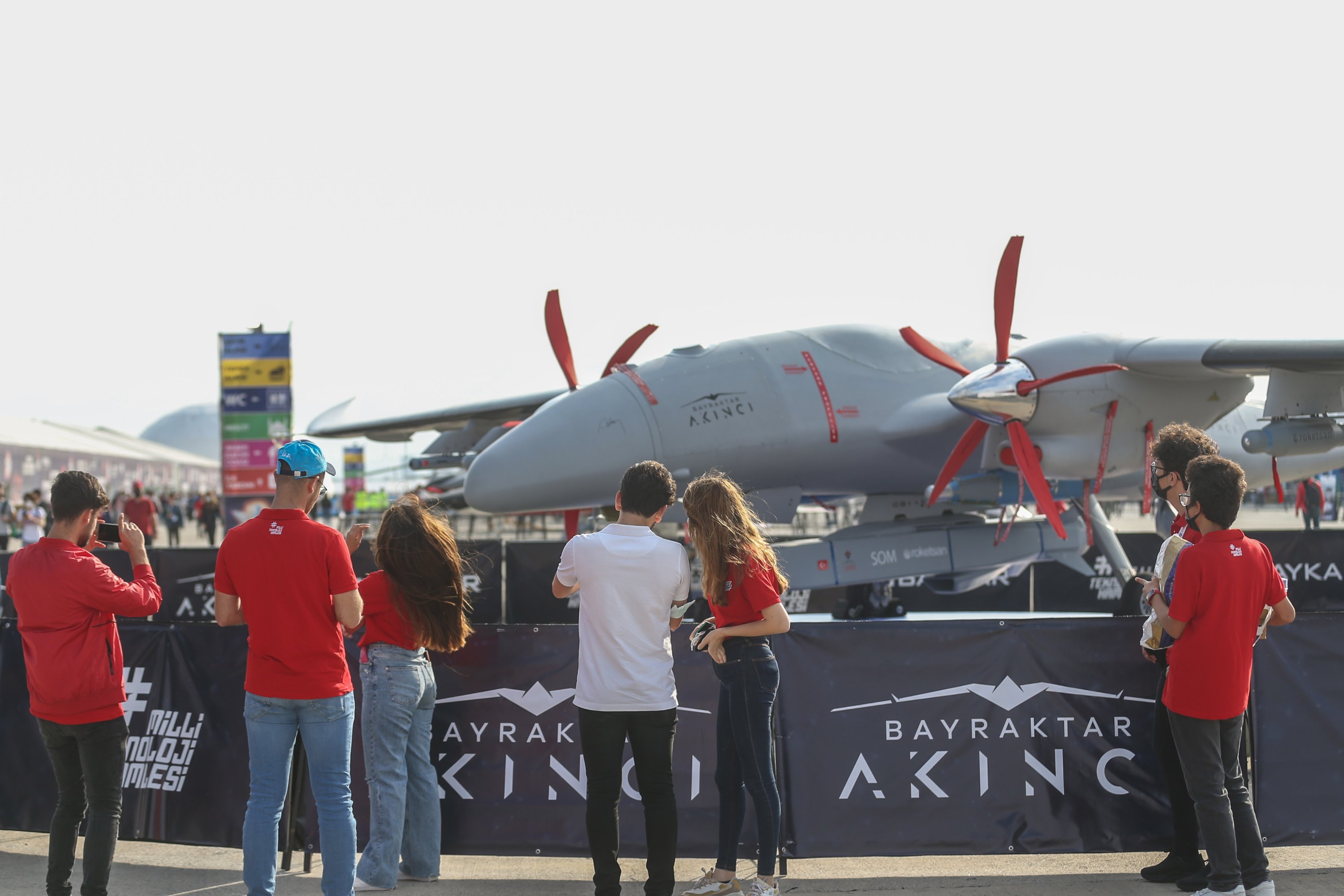 Visitors examine Turkey's landmark unmanned combat aerial vehicle (UCAV) Akıncı, as Turkey’s largest aerospace and technology event Teknofest starts in Istanbul, Turkey, Sept. 21, 2021. (AA Photo)