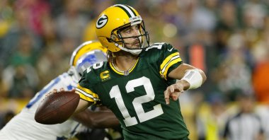 Green Bay Packers quarterback Aaron Rodgers (12) throws a pass against the Detroit Lions during the third quarter at Lambeau Field, Green Bay, Wisconsin, U.S., Sept. 20, 2021. (Jeff Hanisch-USA TODAY Sports via REUTERS)