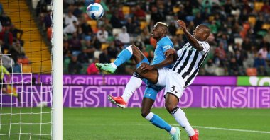 Napoli’s Victor Osimhen (L) scores under pressure from Udinese's Samir during a Serie A match in Udine, Italy, Sept. 20, 2021. (EPA Photo)