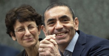 Özlem Türeci (L) and Uğur Şahin sit in the front row in Cologne, Germany, Sept. 17, 2021. (AP Photo)