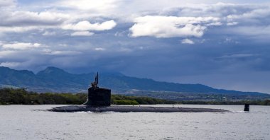 The Virginia-class fast-attack submarine USS Missouri (SSN 780) departs Joint Base Pearl Harbor-Hickam for a scheduled deployment in the 7th Fleet area of responsibility, Sept. 1, 2021. (U.S. Navy via AP)
