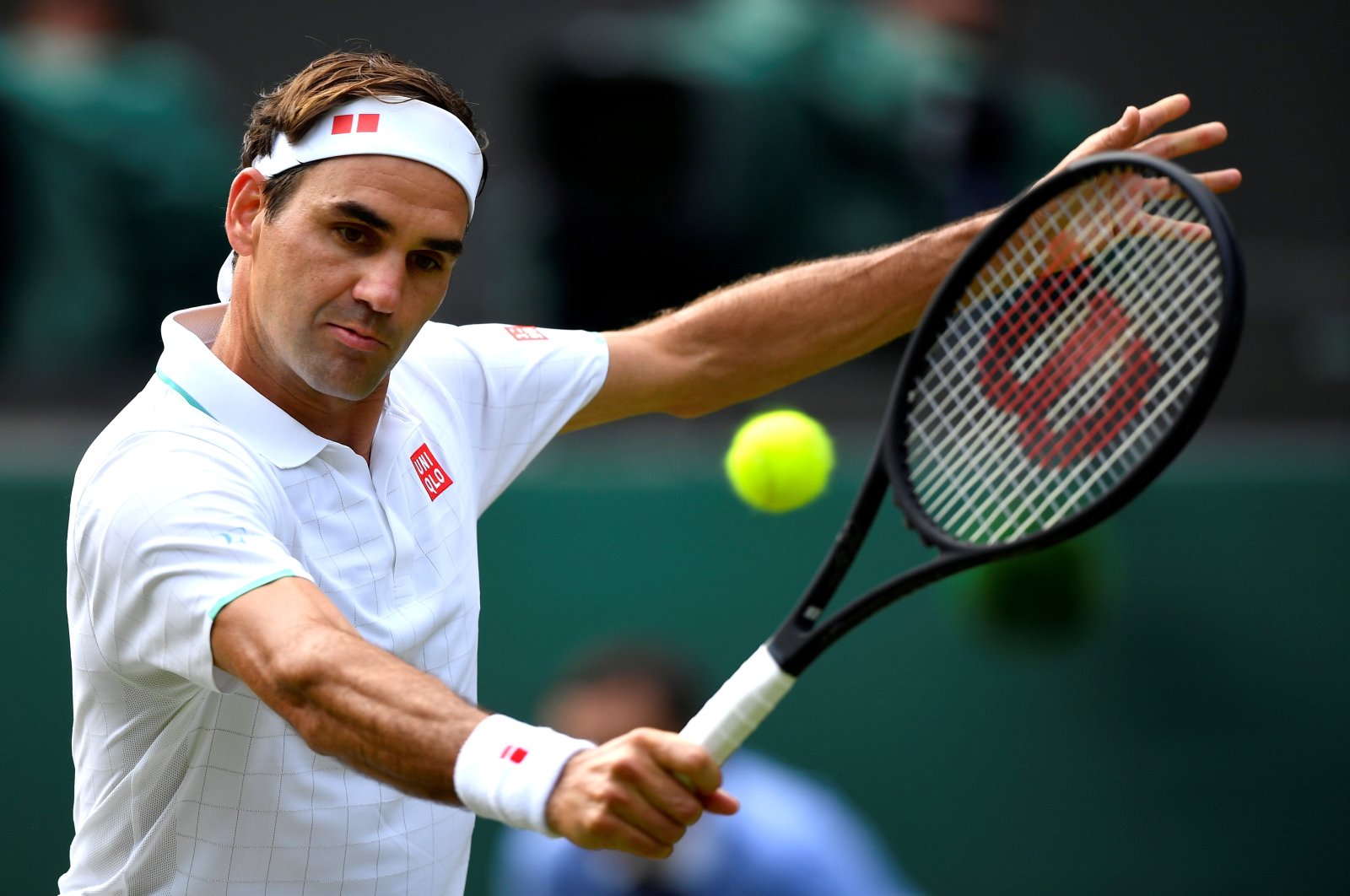 Switzerland's Roger Federer in action during his Wimbledon third-round match against Britain's Cameron Norrie, London, England, July 3, 2021, (Reuters Photo)