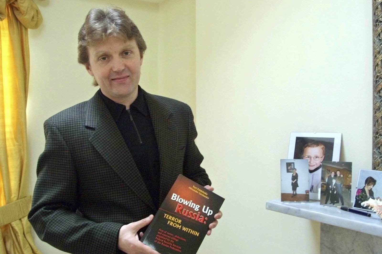 Alexander Litvinenko, former KGB spy and author of the book "Blowing Up Russia: Terror From Within" is photographed at his home in London, U.K., May 10, 2002. (AP Photo)