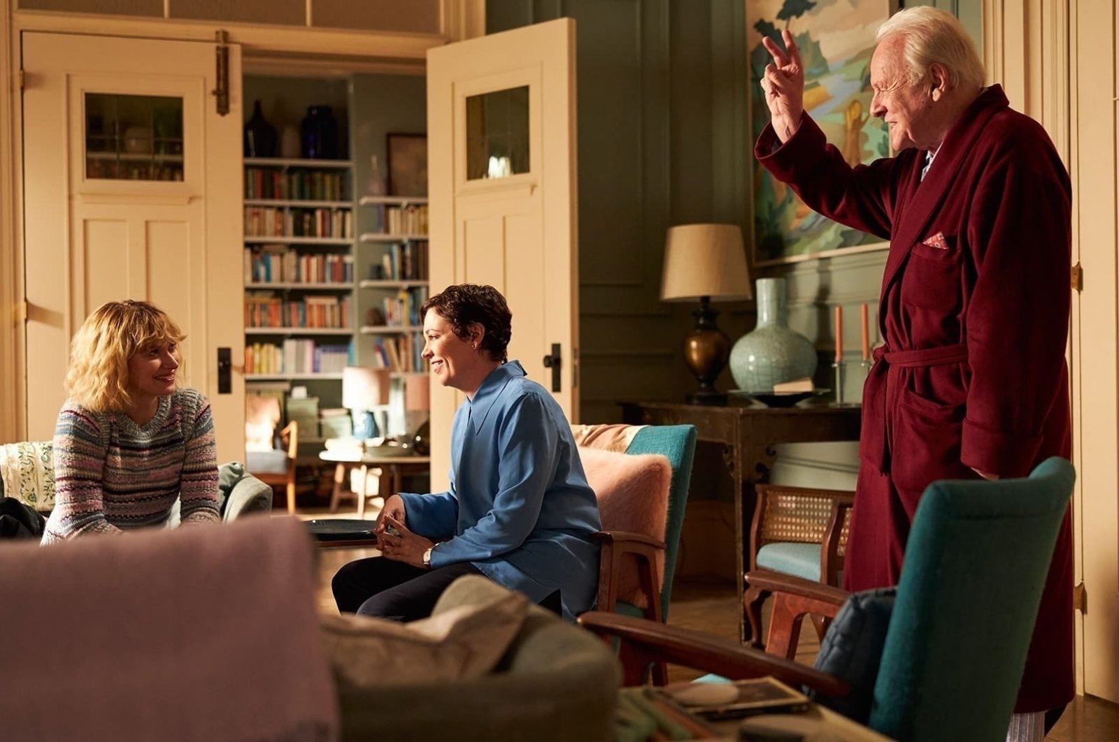 Imogen Poots (L), Olivia Colman (M) and Anthony Hopkins in a scene from "The Father." 