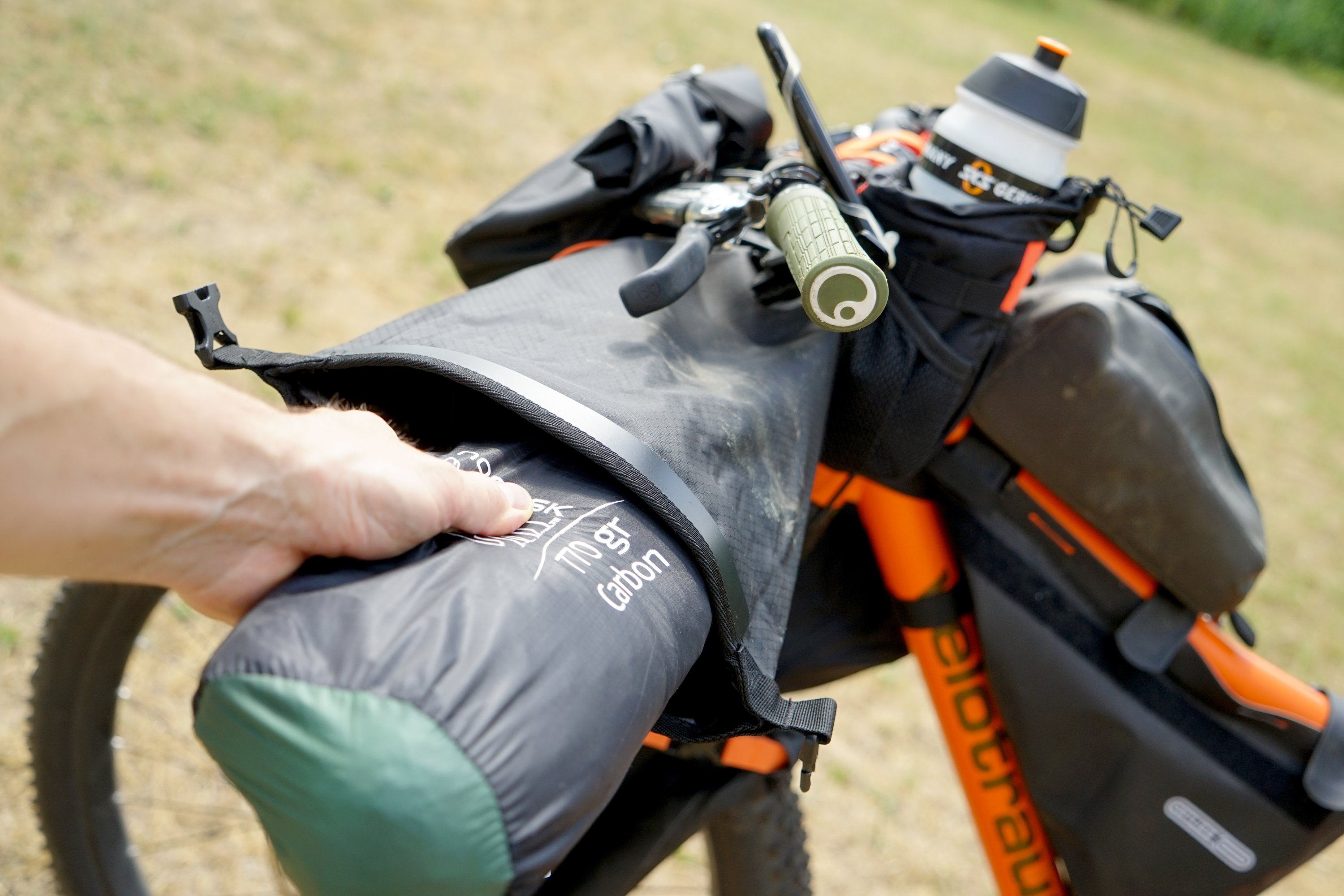 Lightweight equipment such as this one-man tent, which weighs just under 800 grams, is well accommodated in this handlebar bag. (DPA Photo)