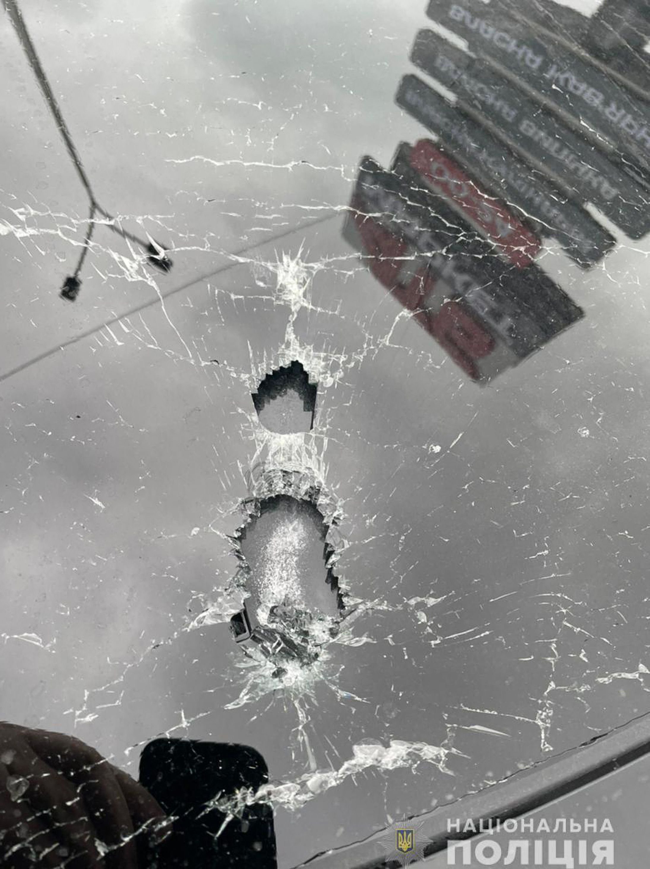 A handout photograph taken and released on Sept. 22, 2021 by the Ukrainian Interior Ministry press office shows the bullet impacts on the car of the Ukrainian president's Chief Aide Sergei Shefir, in Kyiv, Ukraine. (Ukrainian Interior Ministry Press Services via AFP)