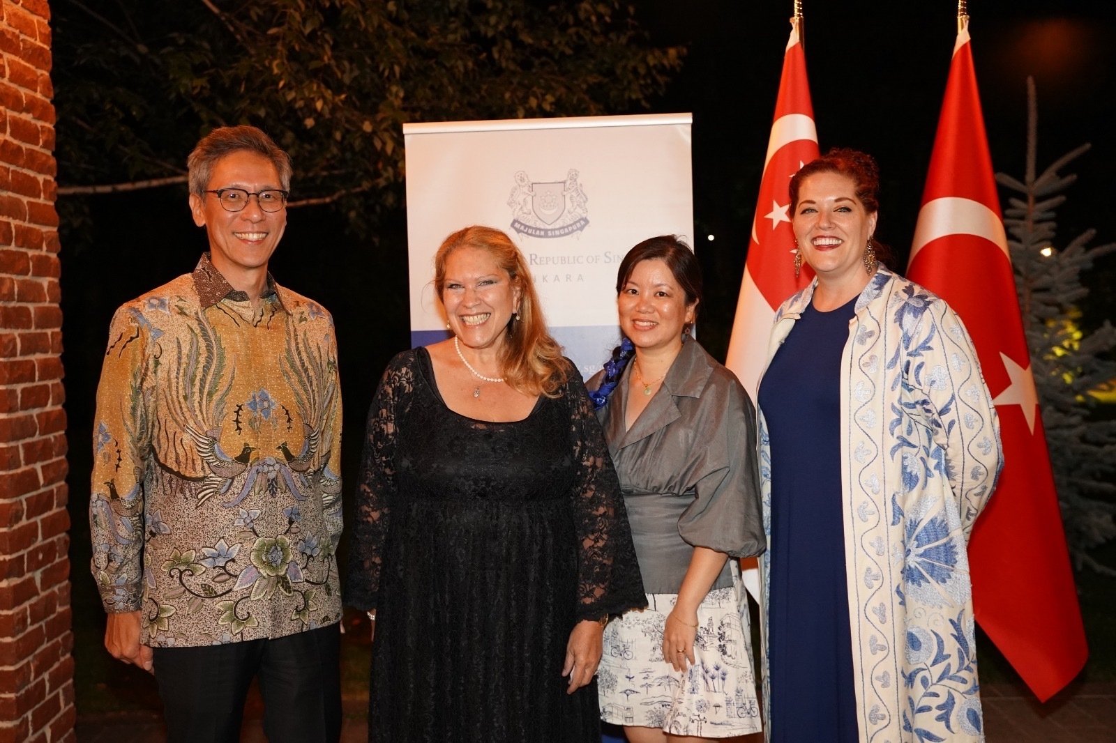 Singapore's Ambassador to Turkey Jonathan Tow (L) together with Kay Redrup (2nd L) at the ambassador's residence in Ankara, Sept.18, 2021 (Courtesy of the embassy)