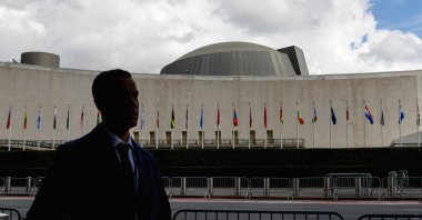 A man walks past the United Nations headquarters during the 76th Session of the U.N. General Assembly in New York City, U.S., Sept. 21, 2021. (AFP Photo)