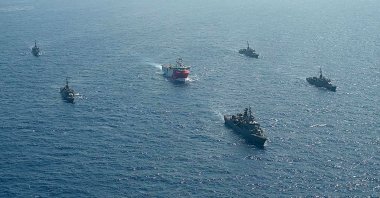 This handout photograph released by the Turkish Defense Ministry shows Turkish seismic research vessel "Oruc Reis" (C) as it is escorted by Turkish Naval ships in the Mediterranean Sea, off Antalya, Aug. 10, 2020. (AFP File Photo)