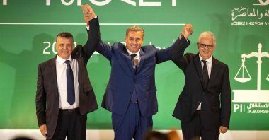 Morocco's prime minister-designate Aziz Akhannouch (C), Abdellatif Ouahbi (L), president of Morocco's Authenticity and Modernity Party (PAM), and Nizar Baraka (R), president of the Istiqlal Party (R), after Akhannouch announced a coalition of RNI, PAM and Istiqlal, Rabat, Morocco, Sept. 22, 2021. (AFP Photo)