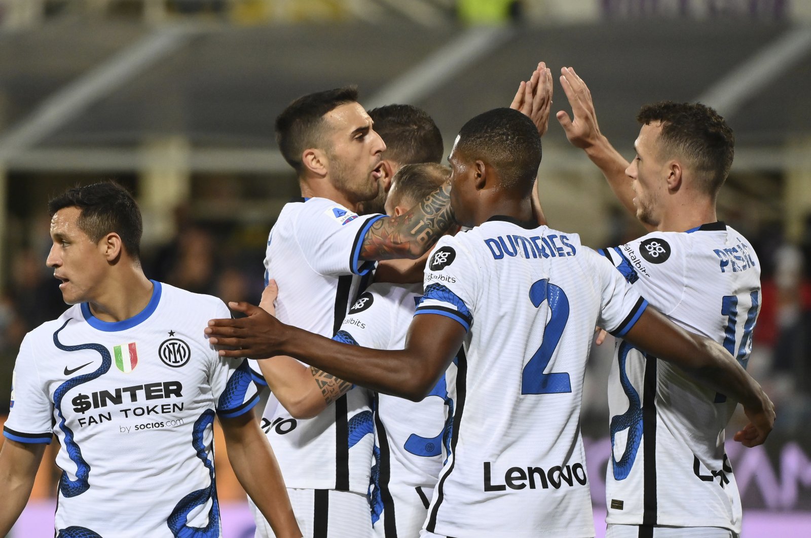 Inter Milan's Ivan Perisic (R) celebrates scoring with teammates in a Serie A match against Fiorentina at the Artemio Franchi stadium in Florence, Italy, Sept. 21, 2021. (AP Photo)