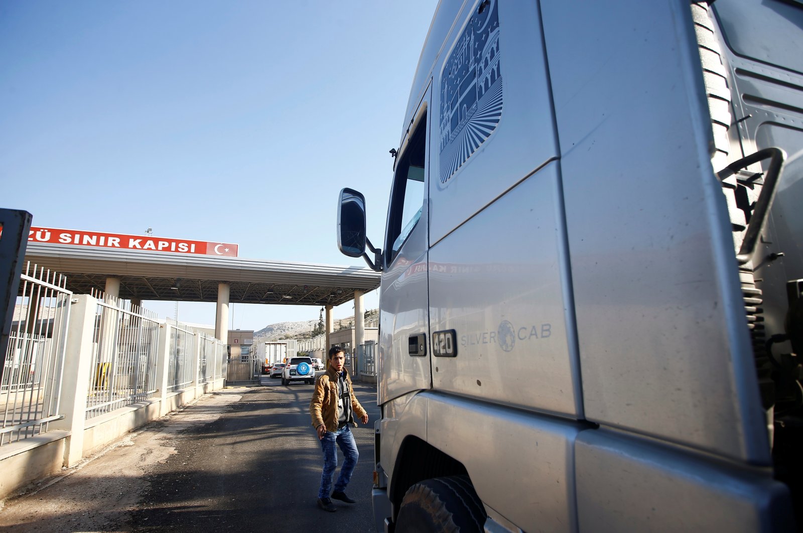 Syria-bound trucks, loaded with humanitarian supplies, arrive at Cilvegözü border gate, located opposite Syrian commercial crossing point Bab al-Hawa in Reyhanlı, in the southern Hatay province, Turkey, Nov. 28, 2016. (Reuters File Photo)