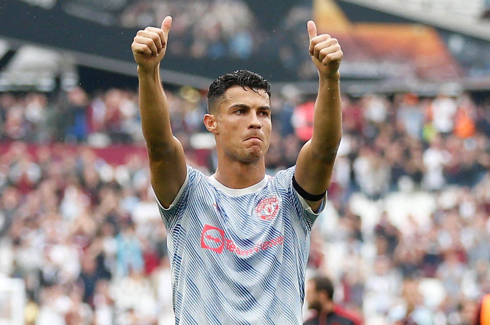 Manchester United's Portuguese striker Cristiano Ronaldo celebrates on the pitch after a Premier League match against West Ham United at The London Stadium, London, England, Sept. 19, 2021. (AFP Photo)