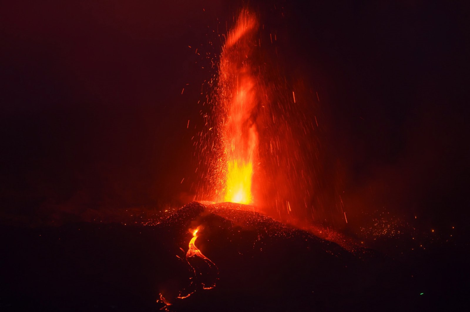 Lava flows from the Cumbre Vieja volcano at the village of El Paso, La Palma, Canary Islands, Sept. 21, 2021. (EPA Photo)