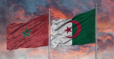 The photo illustration shows the flags of Morocco (L) and Algeria. (Photo by Shutterstock)