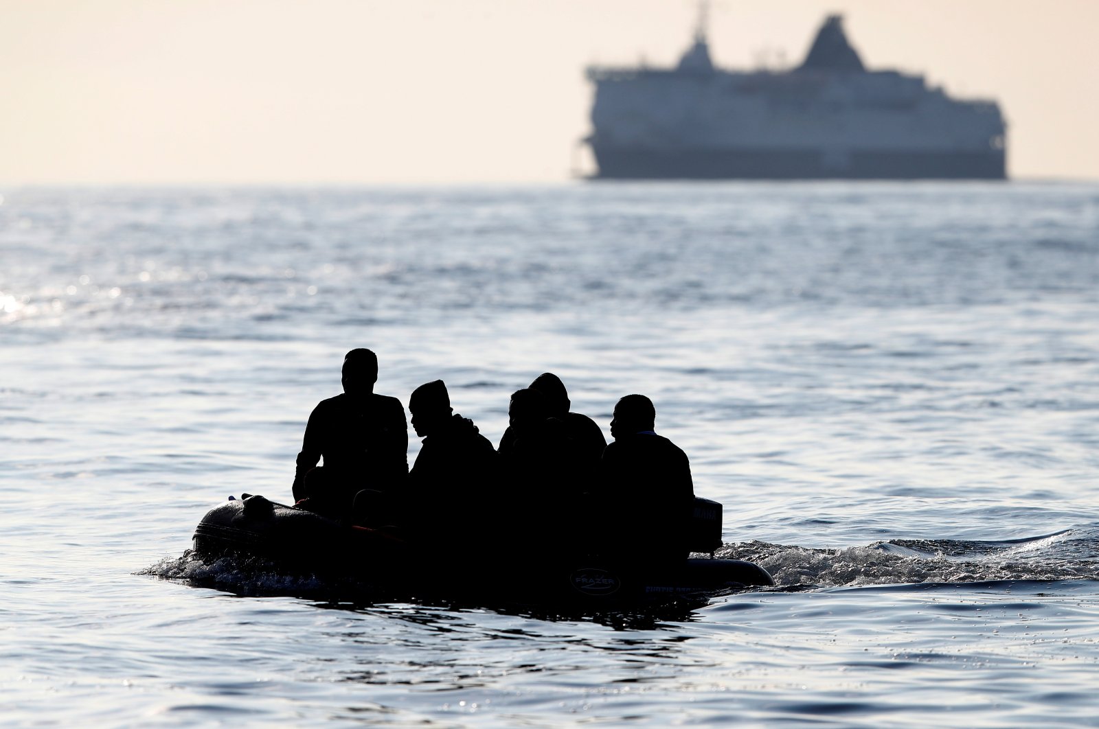 People who say they are from Darfur, Sudan cross the English Channel in an inflatable boat near Dover, Britain, Aug. 4, 2021. (Reuters Photo)