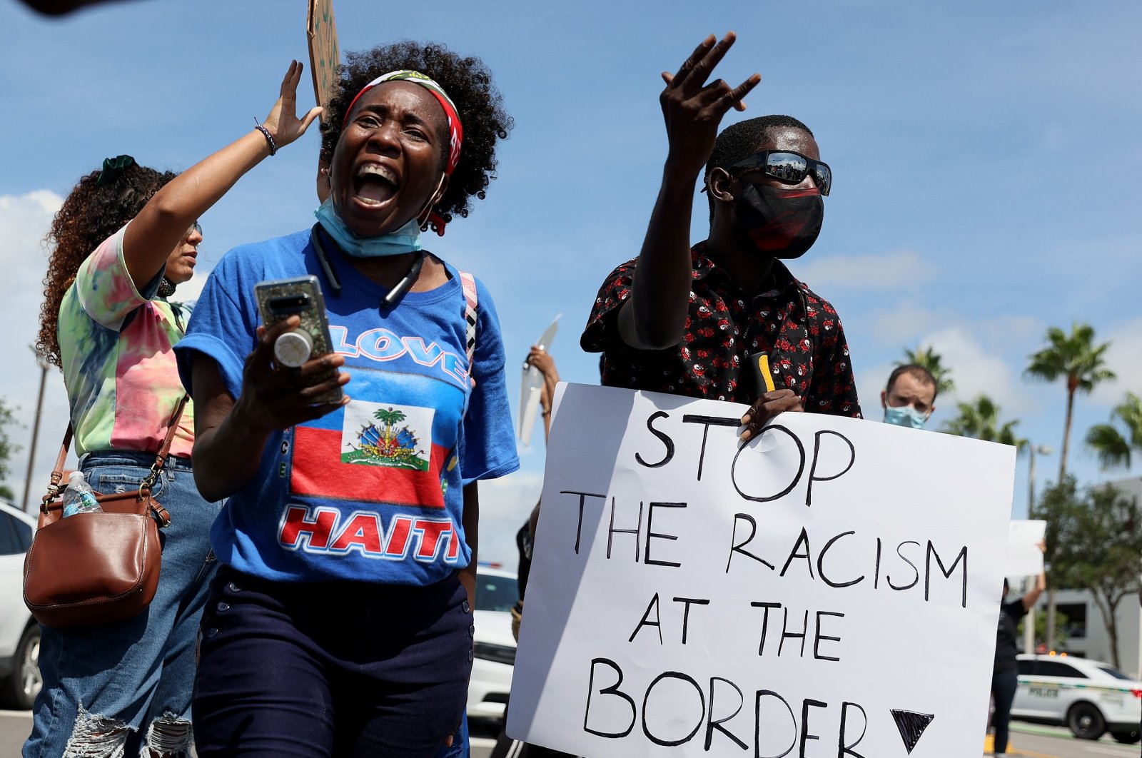 Protesters join together in front of a USCIS building to denounce the expulsion of Haitian refugees from Del Rio, Texas, in Miami, Florida, U.S., Sept. 22, 2021. (AFP Photo)